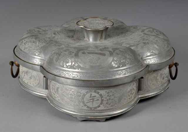 Appraisal: A Fine Chinese Pewter Section Food ContainerOf lotus shape the