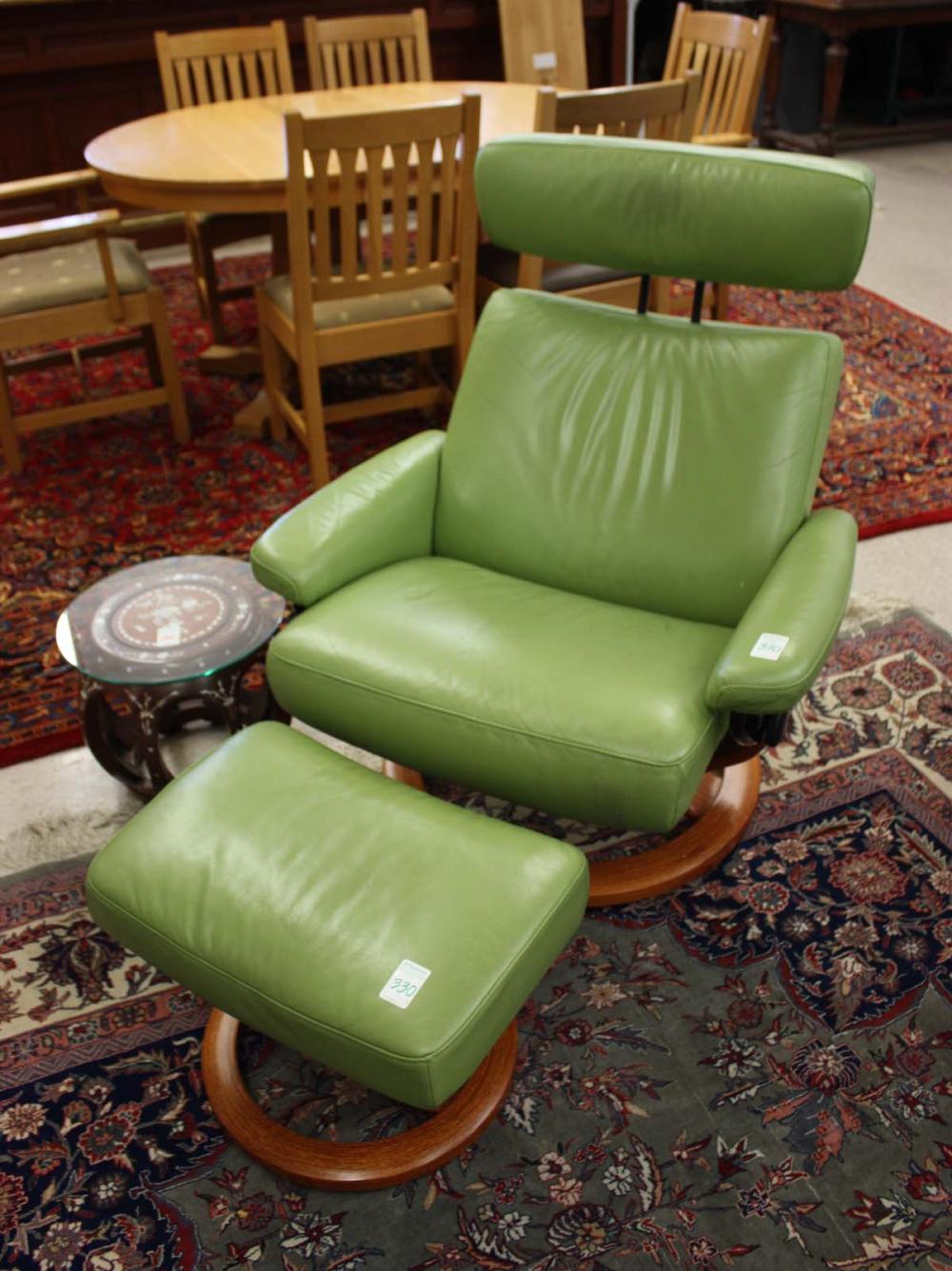 Appraisal: EKORNES NORWEGIAN MODERN 'STRESSLESS' LEATHER RECLINER AND OTTOMAN J E