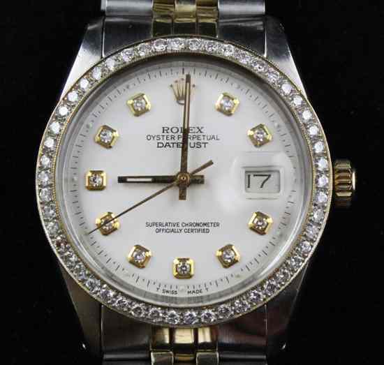 Appraisal: A gentleman's 's diamond set stainless steel and gold Rolex