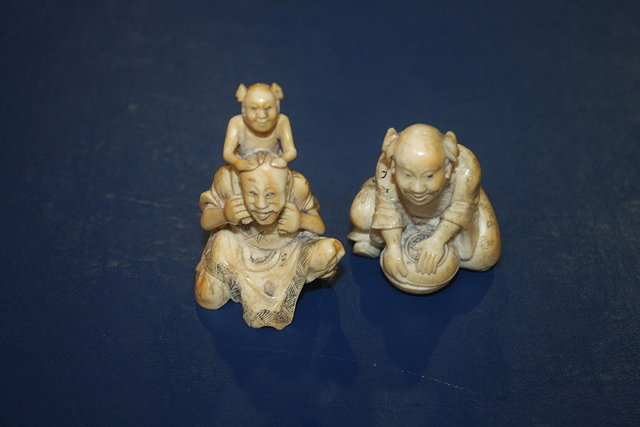 Appraisal: THREE CHINESE SMALL IVORY FIGURE CARVINGS the tallest cm circa