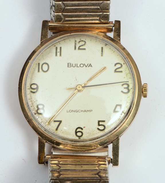 Appraisal: A BULOVA LONGCHAMP CT GOLD GENTLEMAN'S WRIST WATCH with elasticated