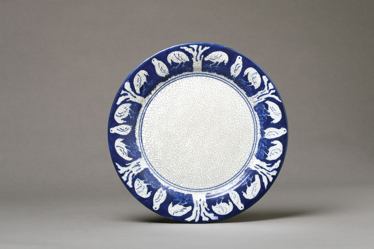 Appraisal: DEDHAM POTTERY 'GROUSE' PATTERN PLATE Painted in dark blue with