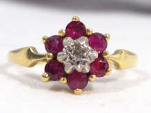 Appraisal: An carat gold ruby and diamond cluster ring