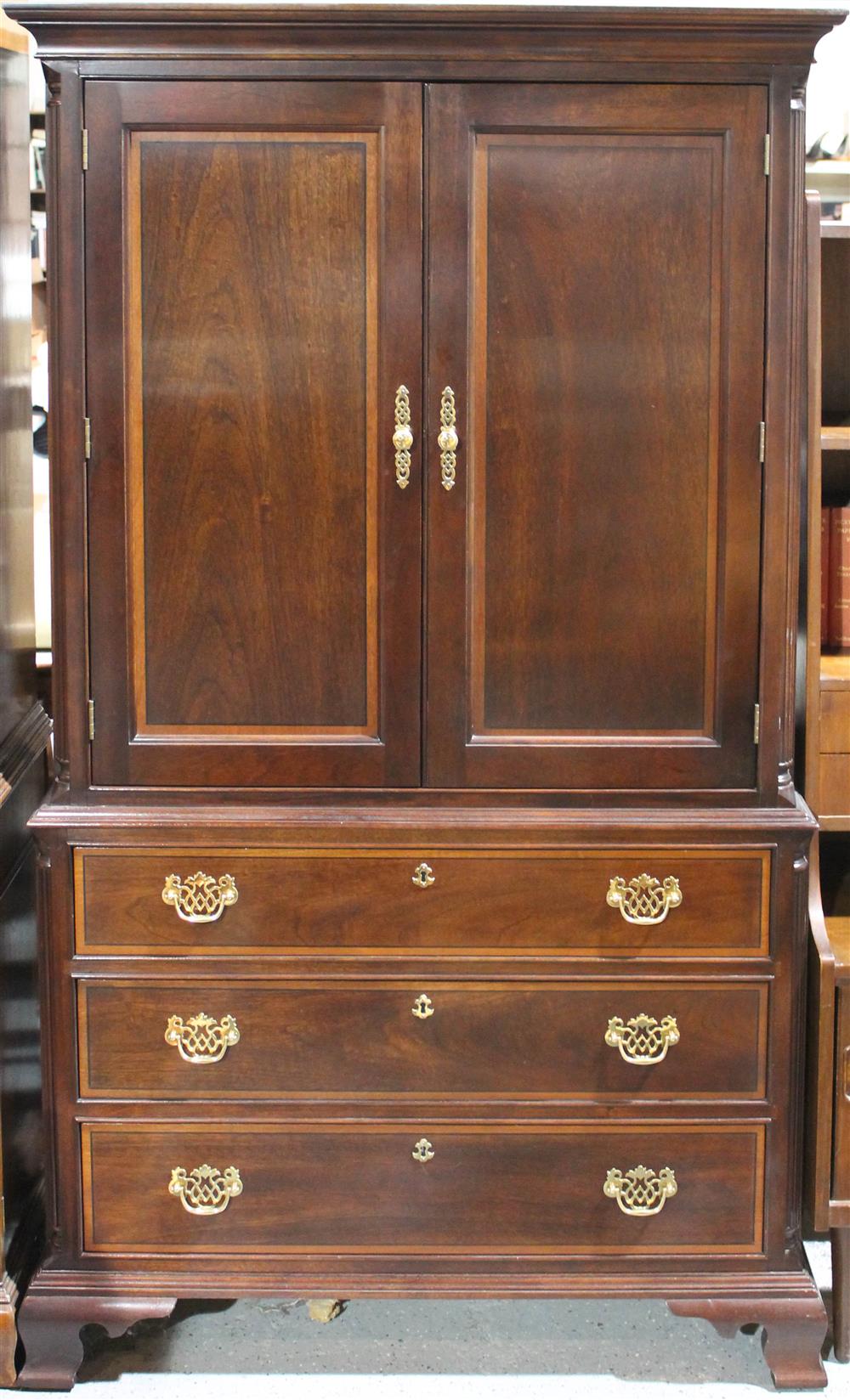 Appraisal: STICKLEY CHIPPENDALE STYLE MAHOGANY ARMOIRE straight pediment over double banded