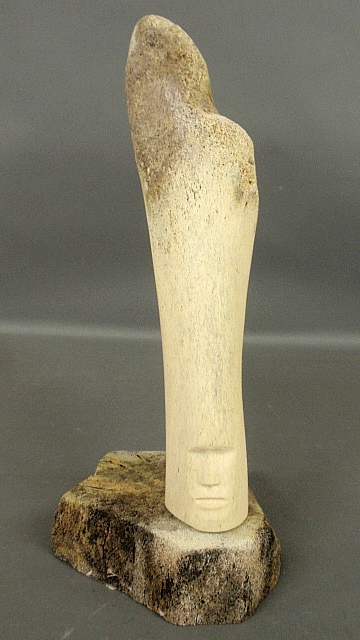 Appraisal: - Large Inuit whalebone with incised man s face h