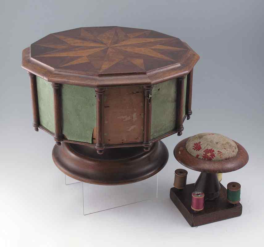 Appraisal: th C SEWING BOX AND PIN CUSHION The revolving sewing