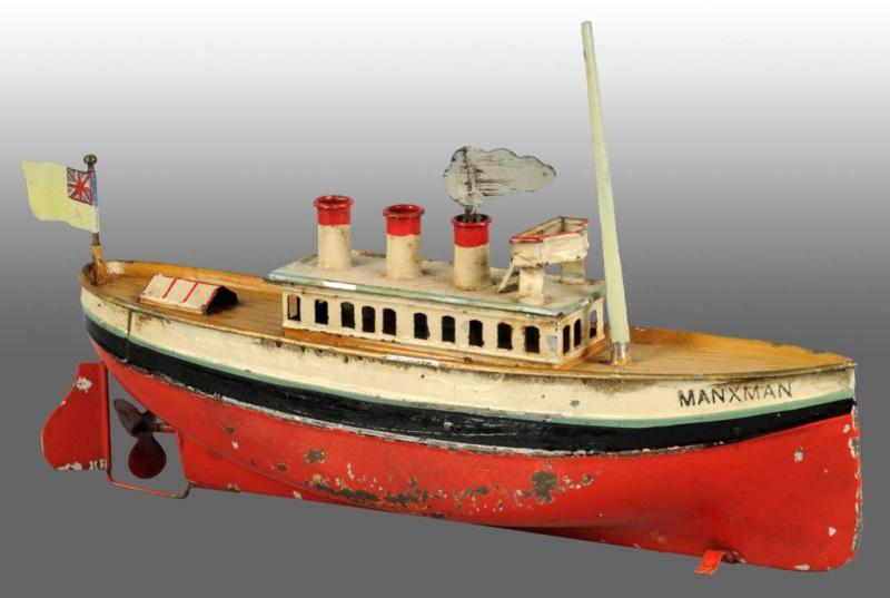 Appraisal: Hand-Painted Carette Boat Wind-Up Toy Description German Marked Manxman on