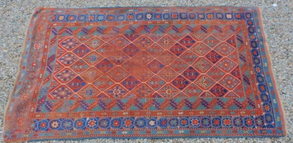 Appraisal: CA CAUCASIAN SCATTER RUG GEOMETRIC DESIGN Shows overall wear through