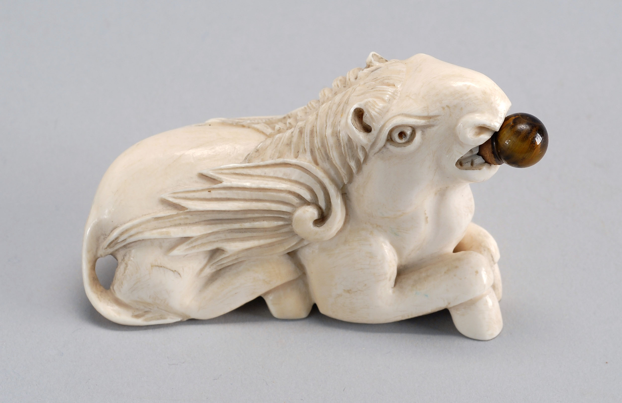 Appraisal: IVORY SNUFF BOTTLE th CenturyIn the form of a reclining