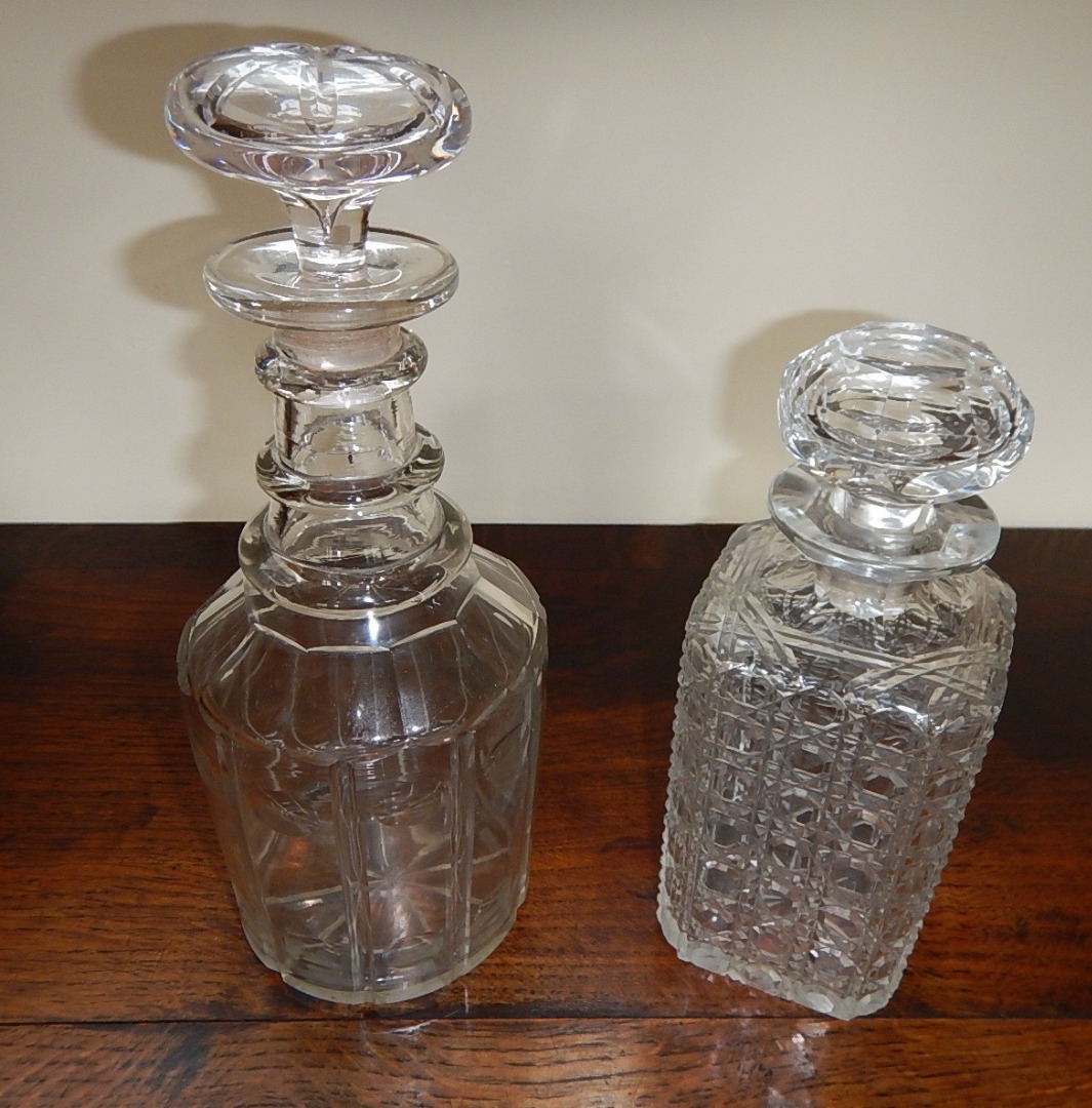 Appraisal: A Georgian ring neck slice cut decanter and a square