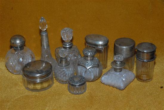 Appraisal: COLLECTION OF ELEVEN STERLING SILVER CAPPED AND GLASS DRESSER BOTTLES