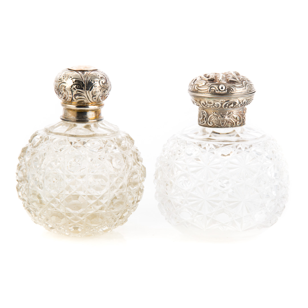 Appraisal: Two Continental cut glass silver scent bottles Cut glass scent