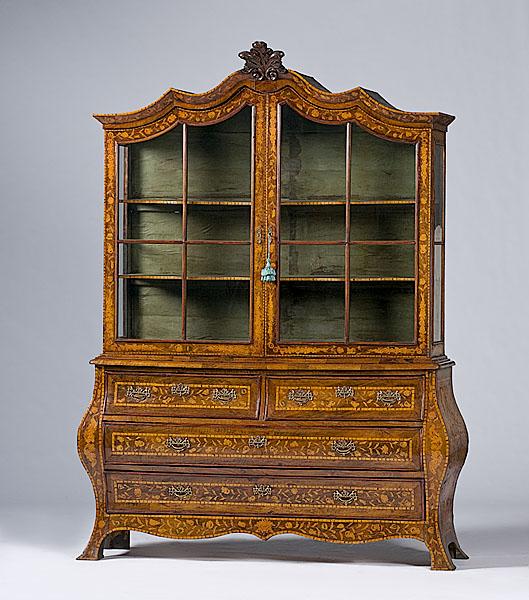 Appraisal: DUTCH BAROQUE-STYLE BOOKCASE CABINET Continental ca - mahogany with pine