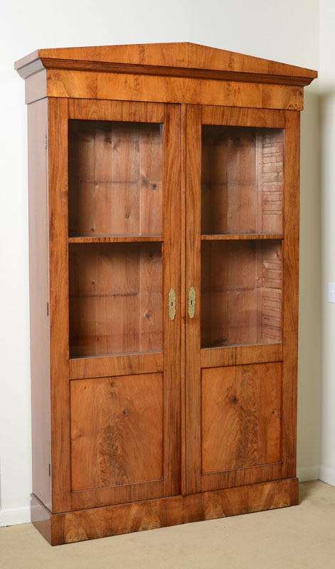 Appraisal: BIEDERMEIER WALNUT BOOKCASE POSSIBLY SWEDISH With a peaked pediment above