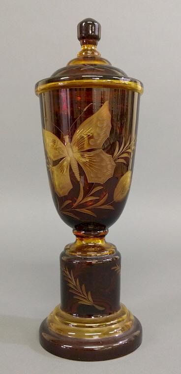 Appraisal: Cranberry Glass Urn Cranberry glass cut to amber covered urn