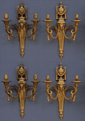 Appraisal: TWO PAIRS OF LOUIS XVI-STYLE GILT-BRONZE TWO-LIGHT WALL APPLIQU S