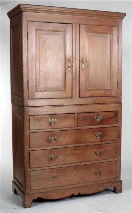 Appraisal: A Georgian pine dresser the projected moulded cornice over two