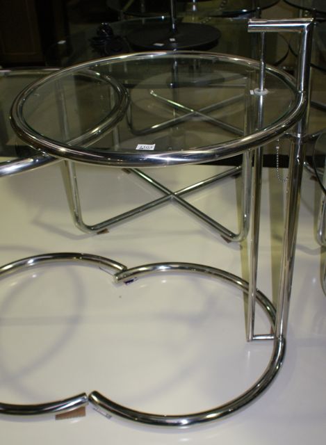 Appraisal: A glass and chromed steel side table by Eileen Gray