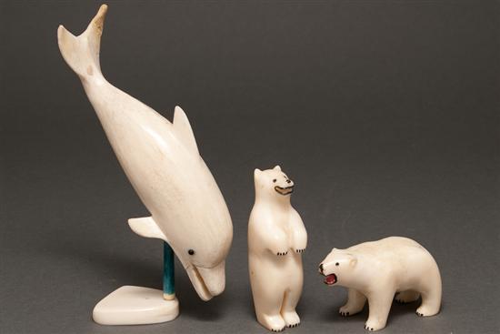 Appraisal: Inuit carved bone porpoise mounted on an ivory base in