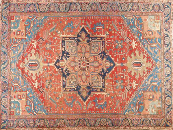 Appraisal: HERIZ ORIENTAL RUG Room-sized rug with dark red central medallion