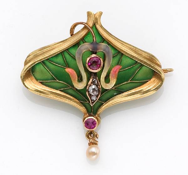 Appraisal: An art nouveau plique- -jour enamel ruby and diamond brooch-pendant