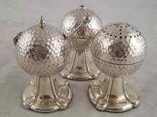 Appraisal: A three piece silver cruet designed as golf balls comprising