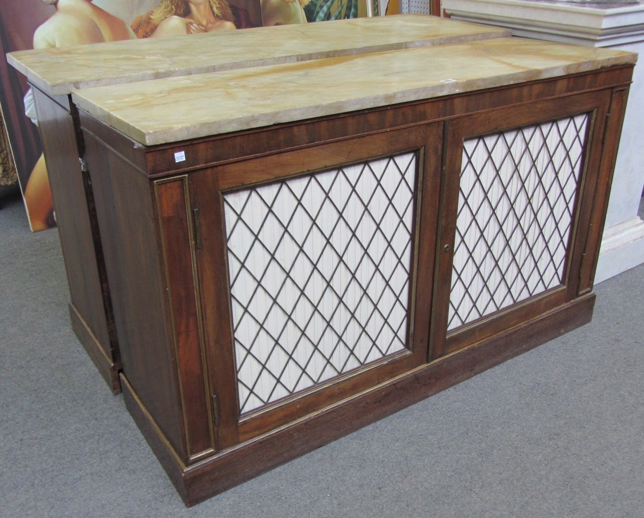 Appraisal: A pair of Regency and later marble topped rectangular side