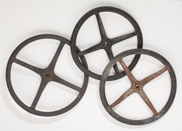 Appraisal: TWO MODEL T STEERING WHEELS PLUS ONE EXTRA STEERING WHEEL