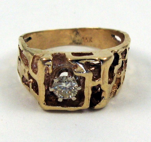 Appraisal: DIAMOND AND FOURTEEN KARAT GOLD RING set with a round