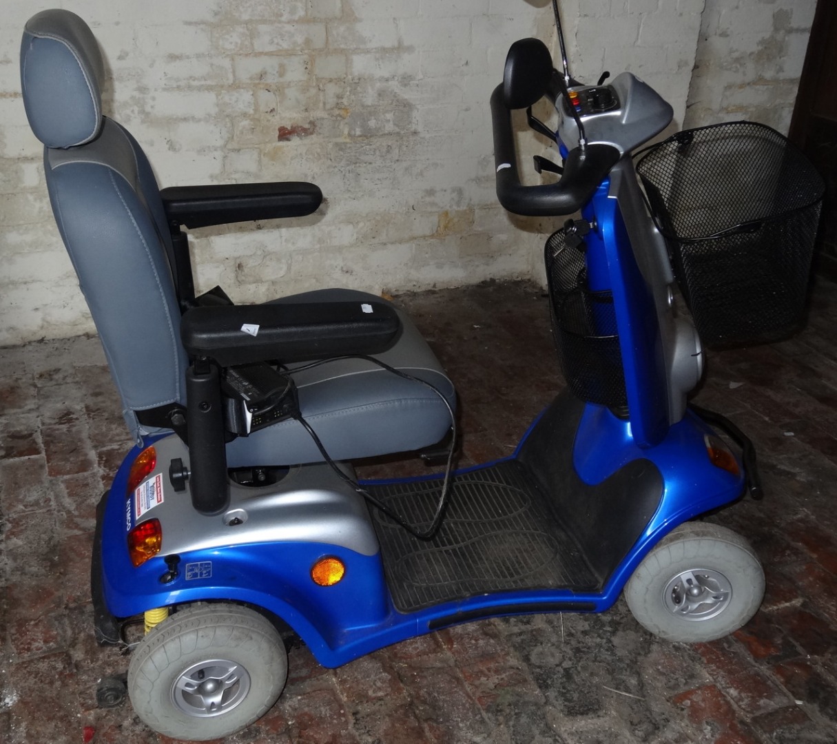 Appraisal: A Kymco four wheeled mobility scooter c with accessories cm