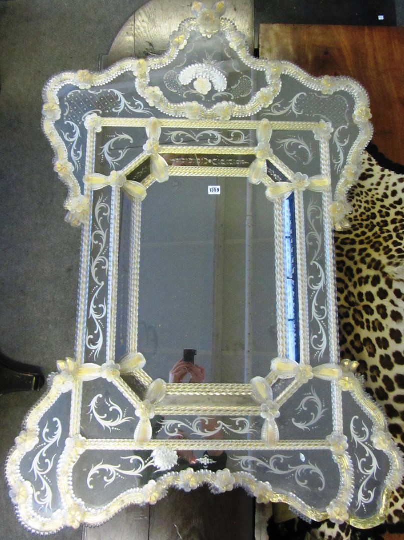 Appraisal: A large th century shaped Venetian wall mirror with twist