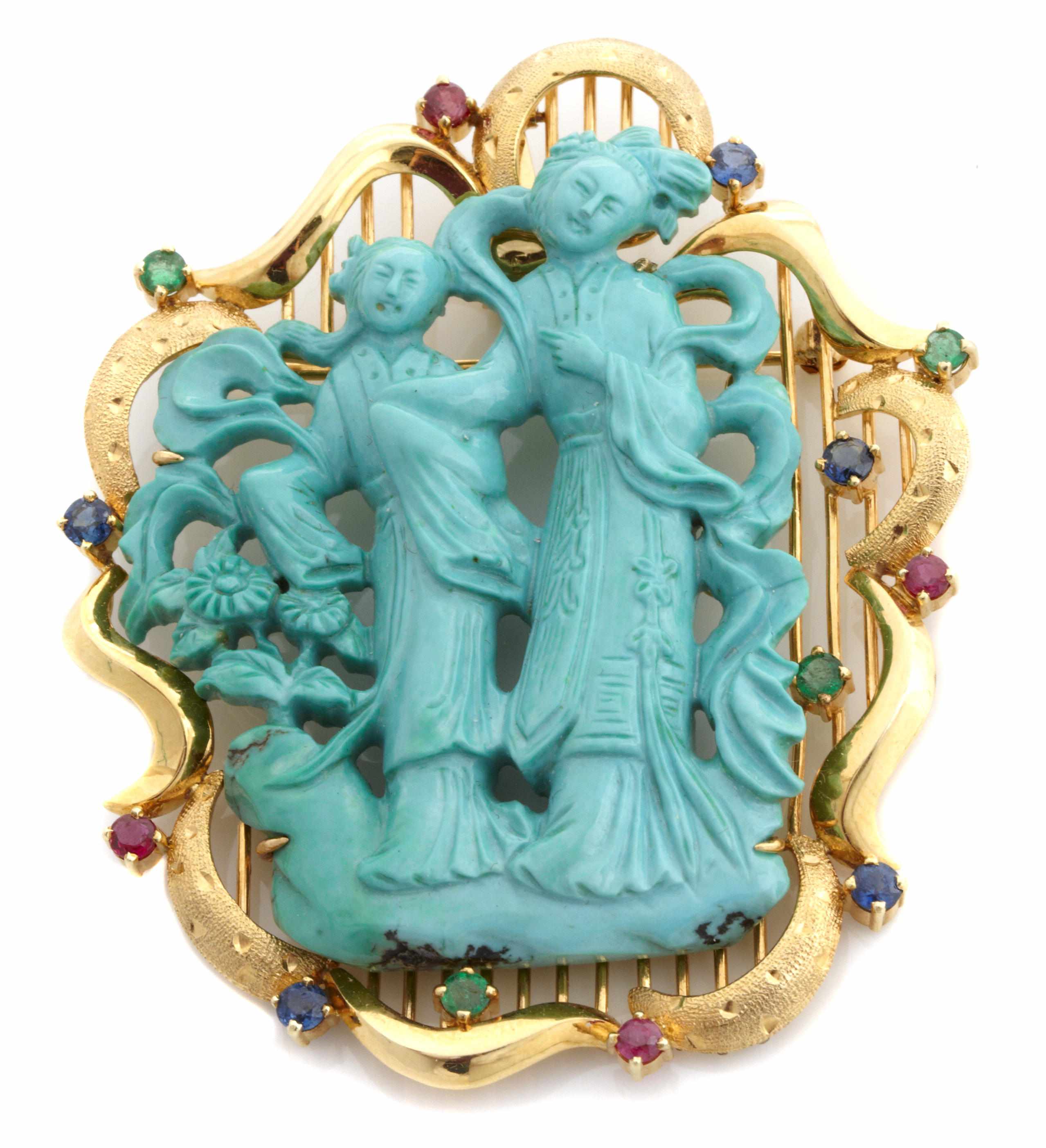 Appraisal: A carved turquoise gem-set and k gold brooch-pendant dimensions approximately