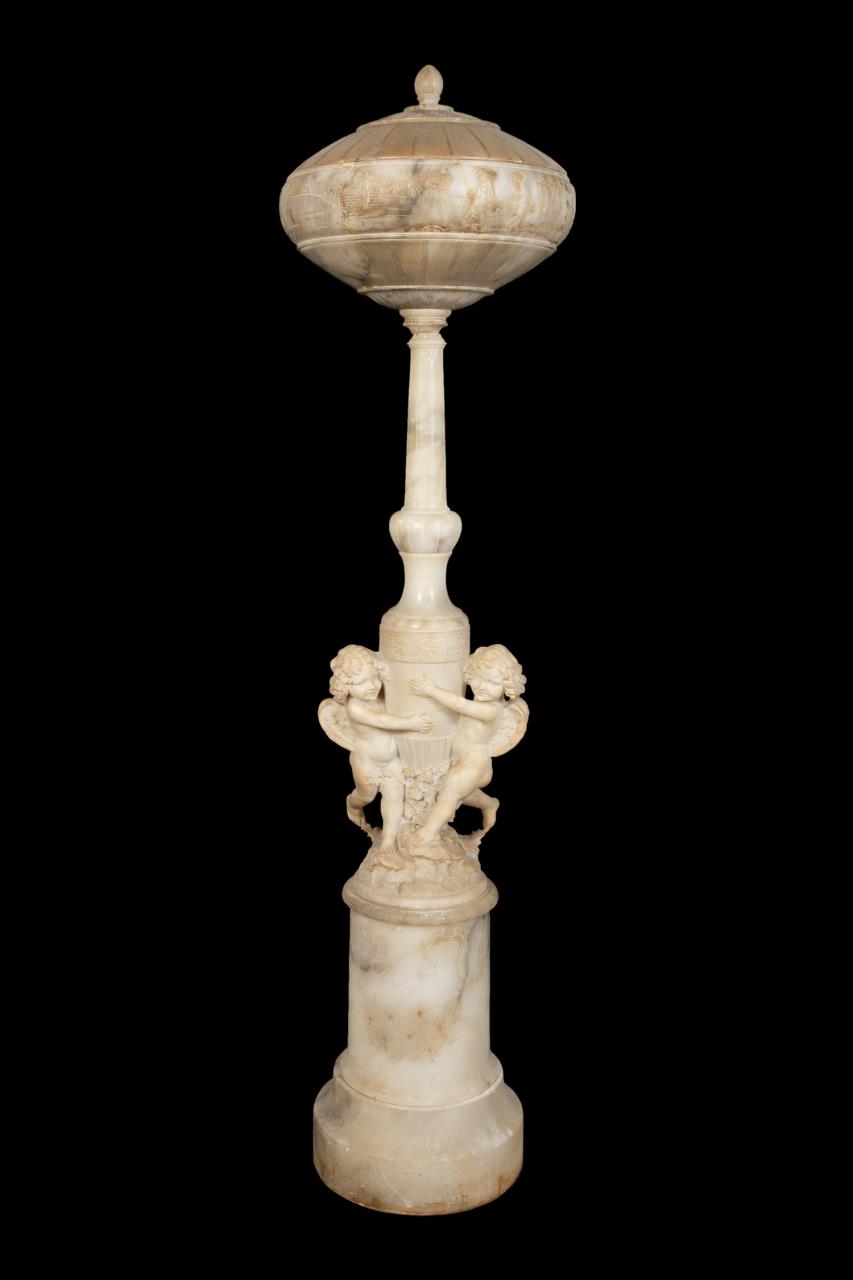 Appraisal: MONUMENTAL CARVED ALABASTER CHERUB FLOOR LAMP Italian School monumental carved