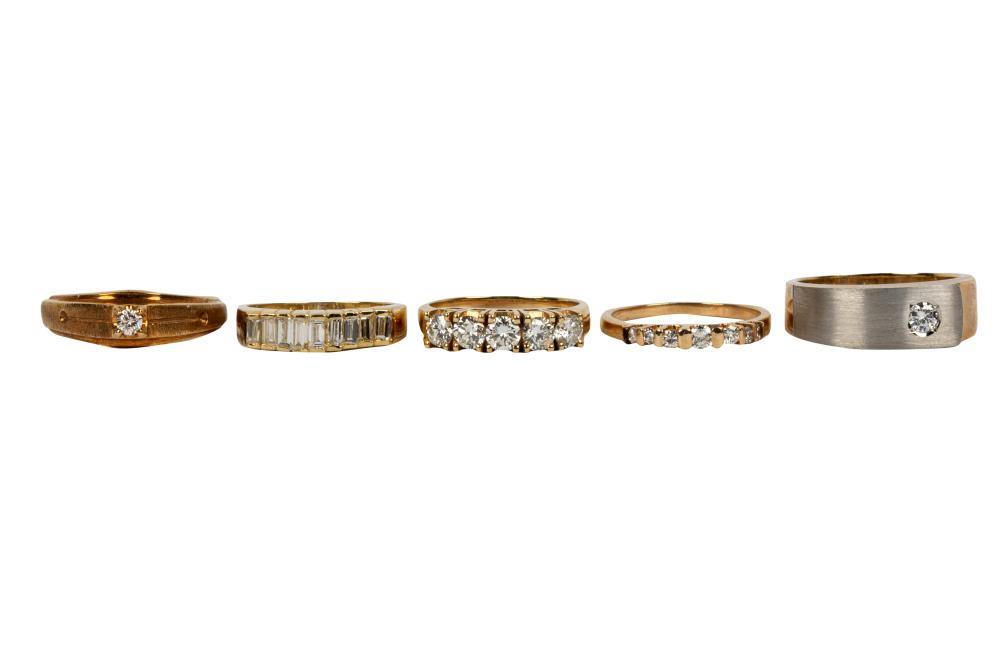 Appraisal: FIVE ASSORTED KARAT YELLOW GOLD DIAMOND BAND RINGSone ring containing