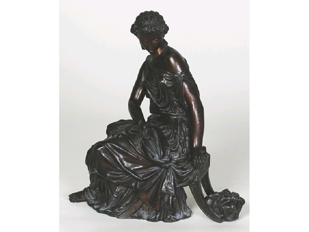 Appraisal: SPELTER CLASSICAL FEMALE FIGURE cast seated holding wheat dark brown