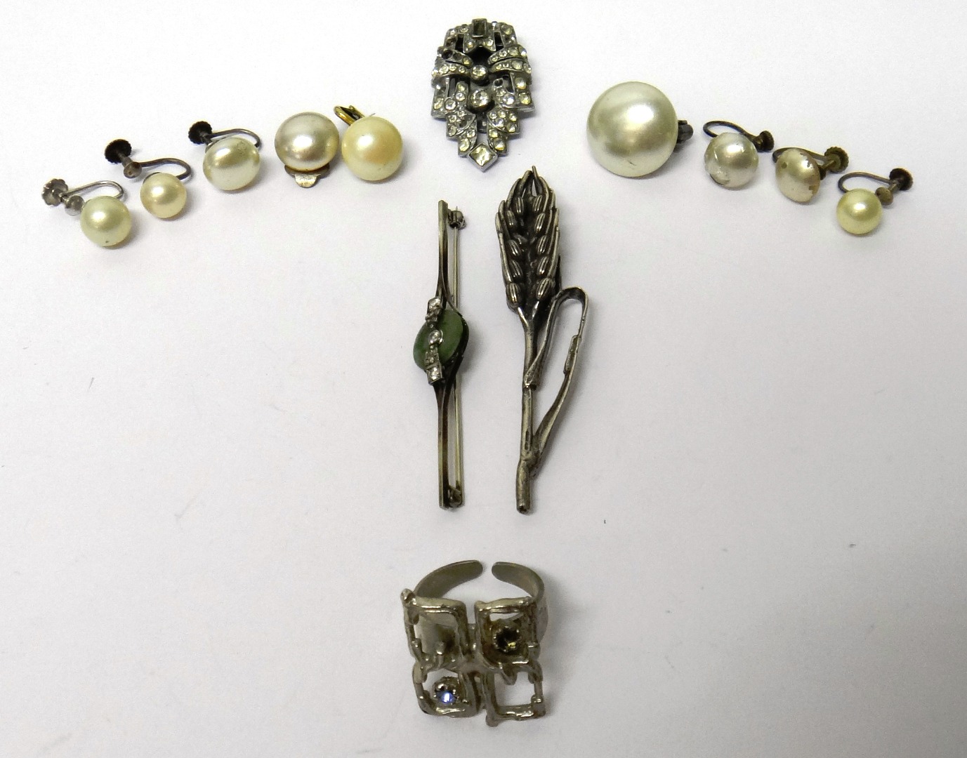 Appraisal: A diamond set and jade bar brooch a silver pendant