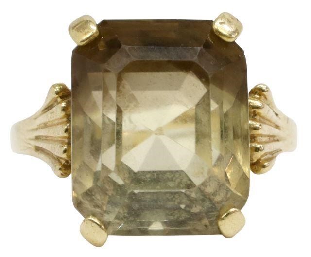 Appraisal: Estate kt yellow gold ring set with a two-tone quartz