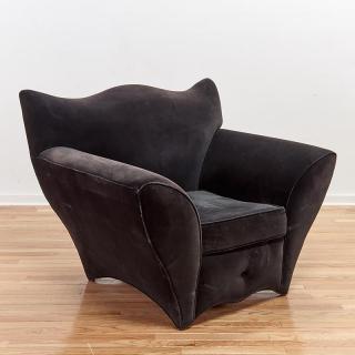 Appraisal: Art Deco style black velvet club chair Art Deco style