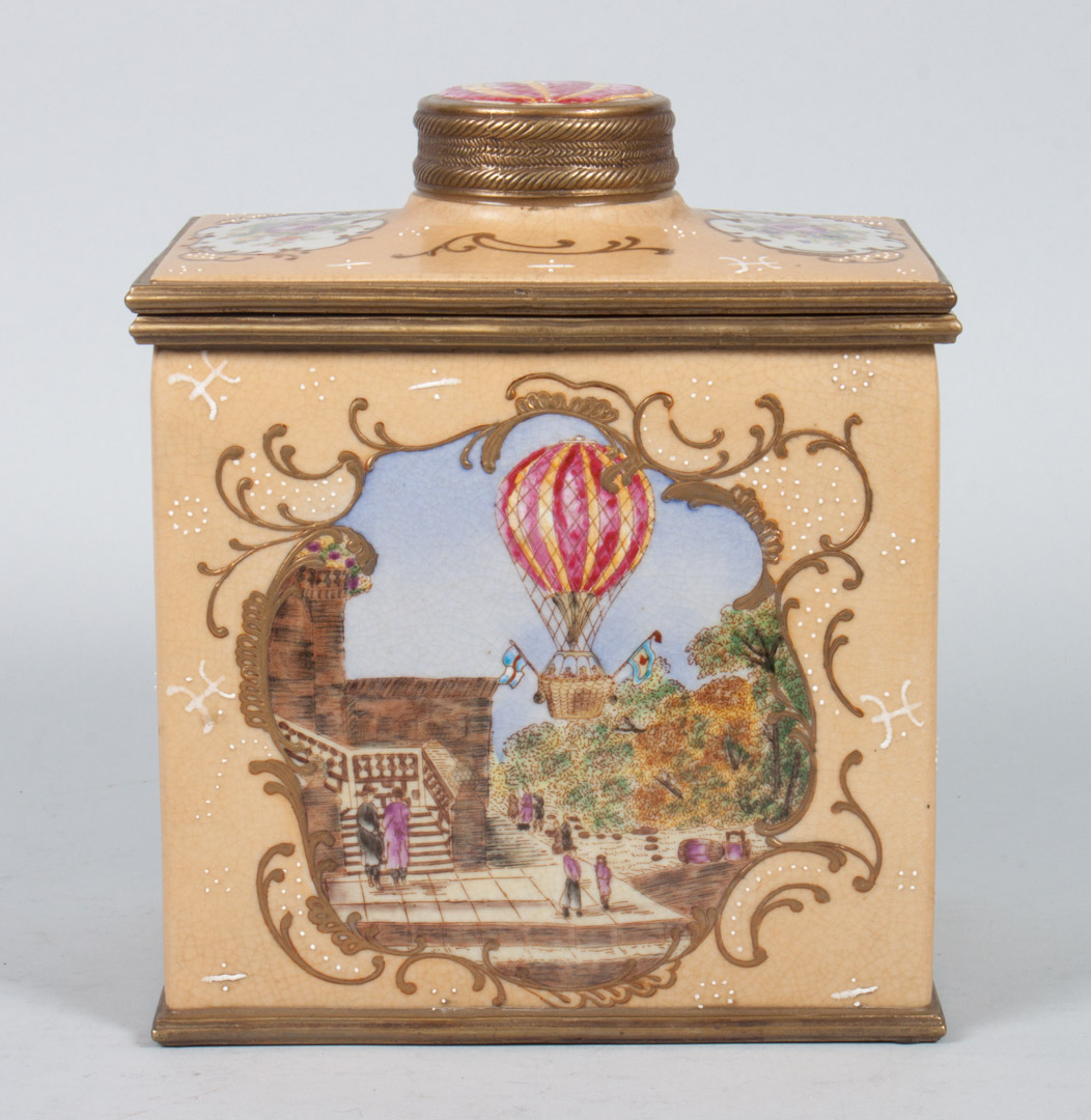 Appraisal: Georgian style porcelain tea caddy gilt-metal-mounted porcelain tea caddy-form box