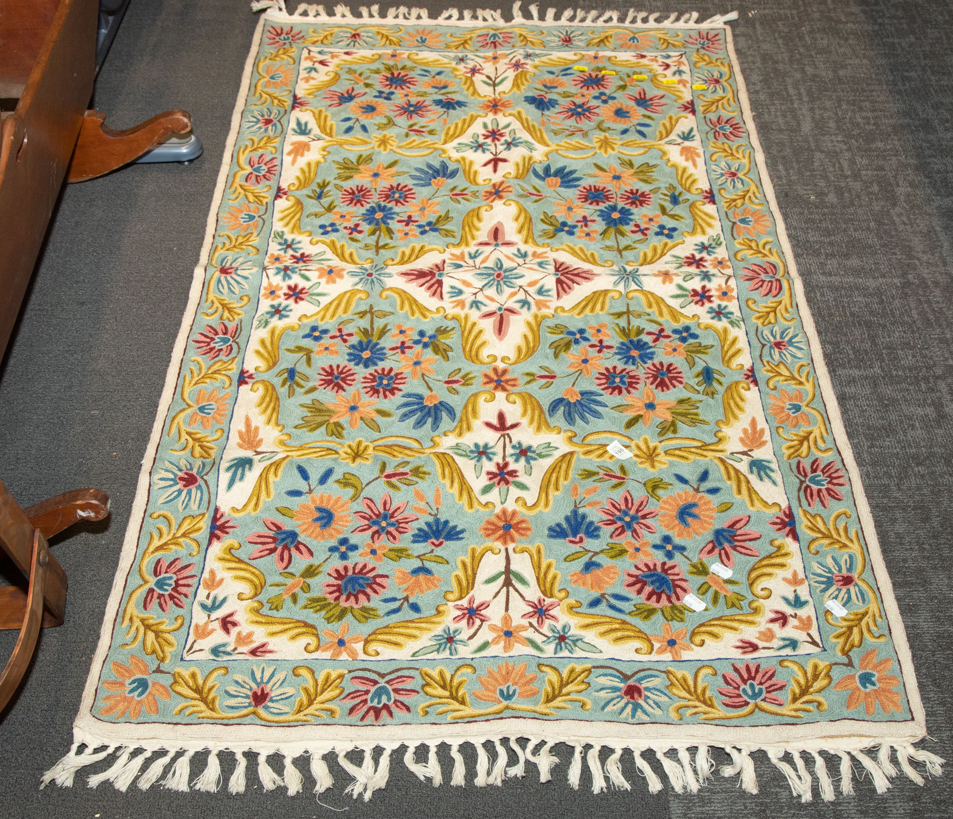 Appraisal: AN INDIAN CHAIN-STITCH EMBROIDERY RUG Kashmir later th century