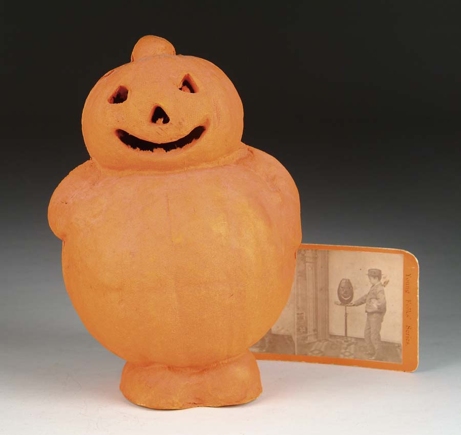 Appraisal: LOT OF TWO HALLOWEEN ITEMS Lot includes pressed paper pumpkin