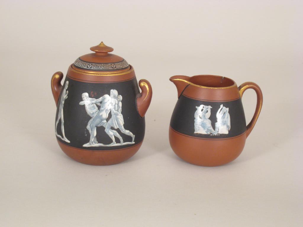 Appraisal: Two pieces of Prattware decorated classical scenes on black backgrounds