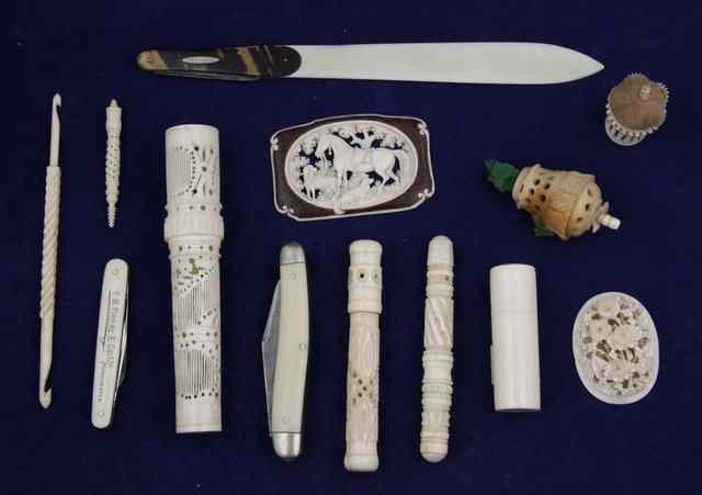 Appraisal: Five carved ivory bodkin cases cm long and smaller two