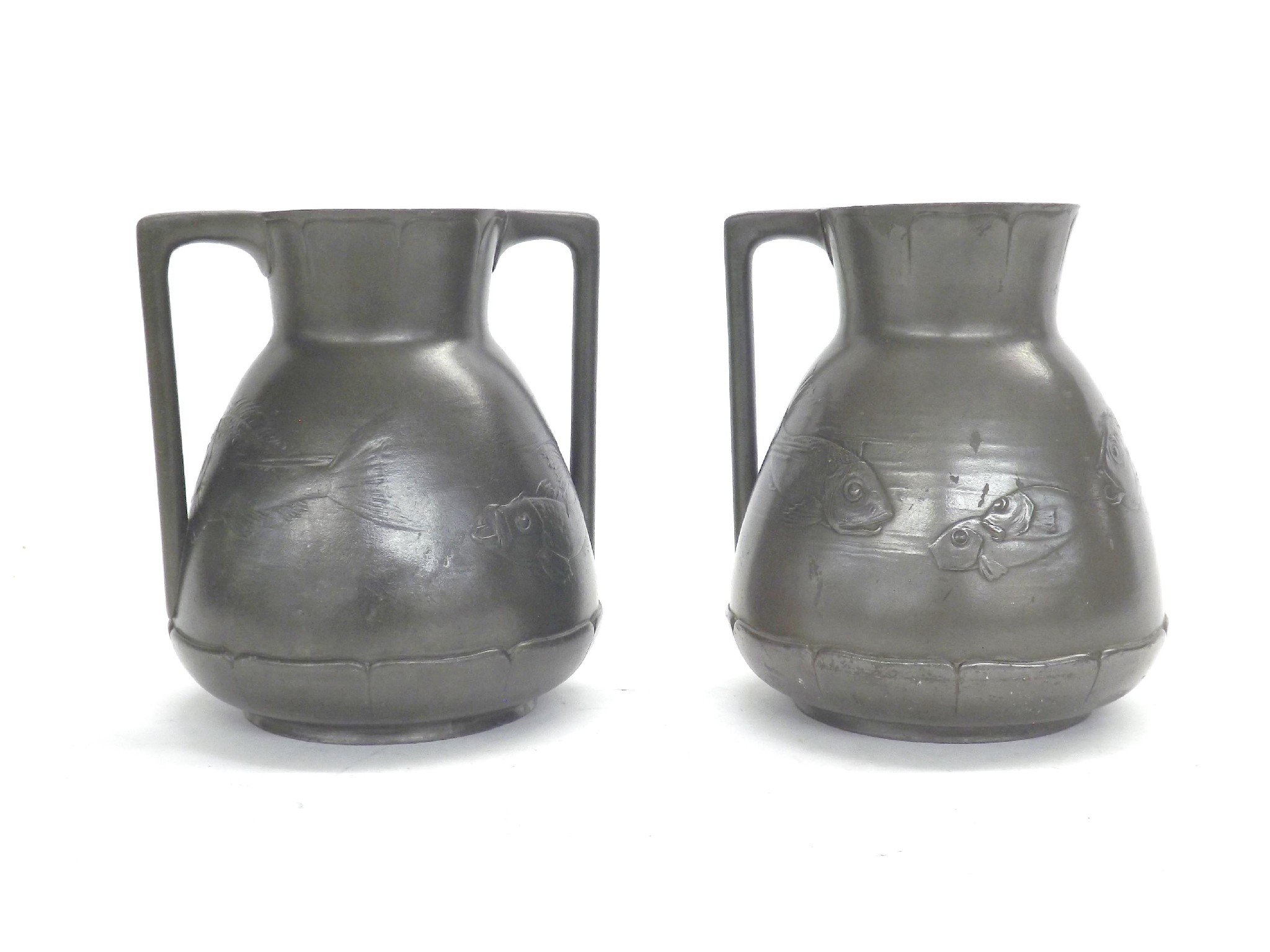 Appraisal: Two similar Kayserzinn Art Nouveau pewter jugs single and double