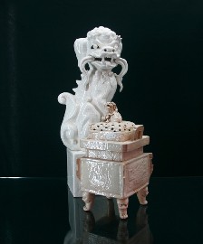 Appraisal: A Chinese porcelain dog of fo on stand in white