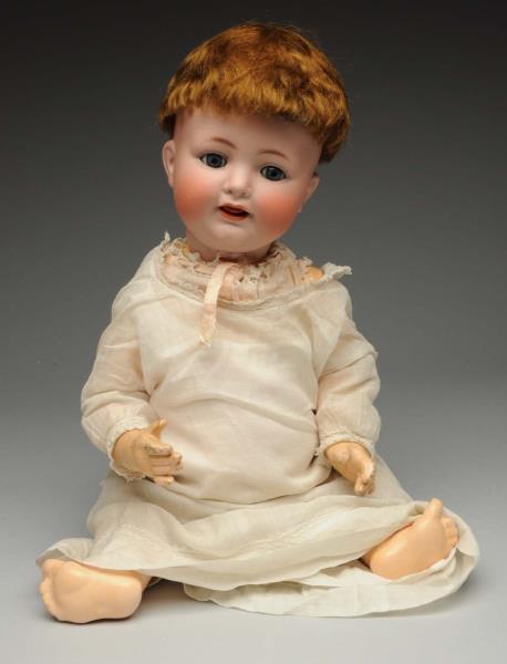 Appraisal: Smiling K R Character Baby Doll German bisque socket head