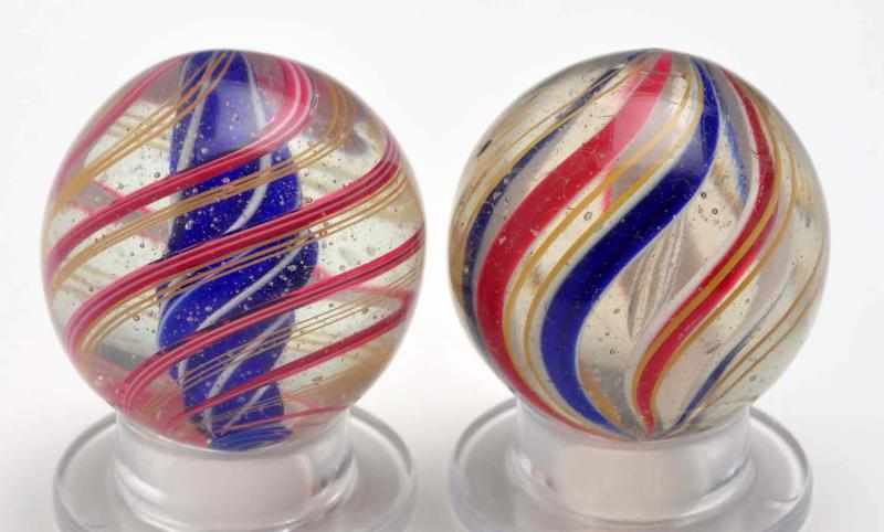 Appraisal: Lot of Swirl Marbles Description Includes one blue solid core