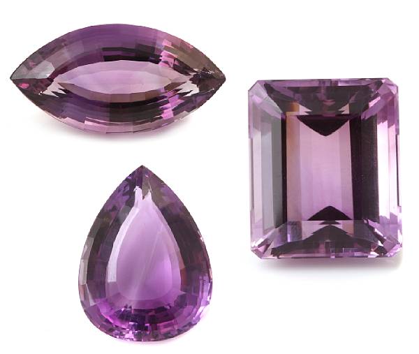 Appraisal: A collection of three unmounted faceted amethysts featuring a rectangle