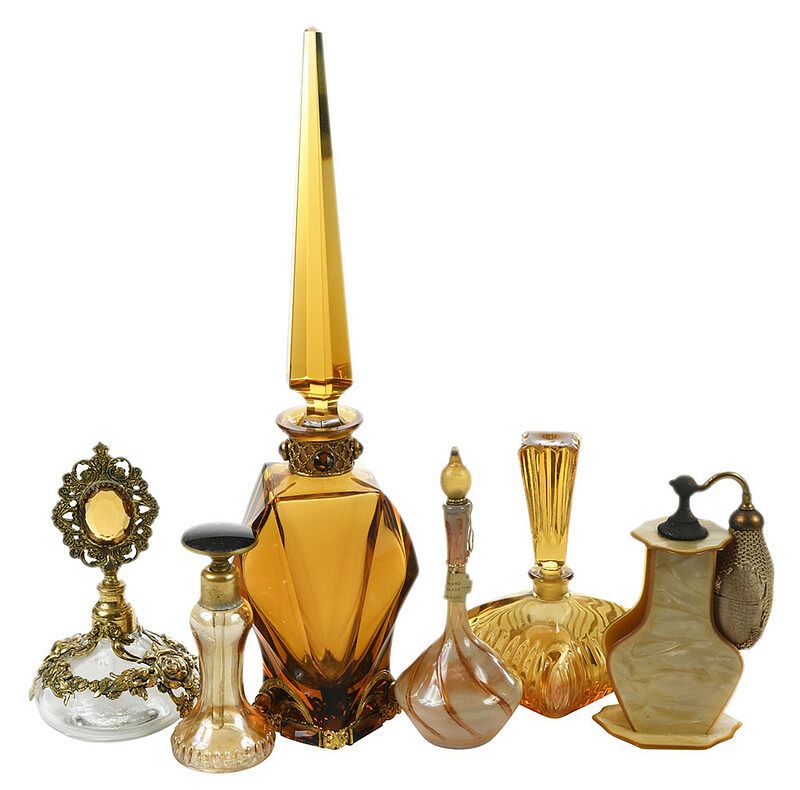 Appraisal: Six Amber Glass Atomizer and Perfume Bottles Continental late th