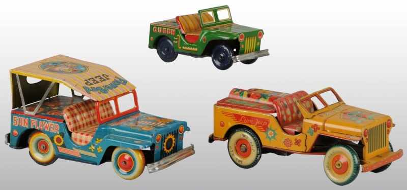 Appraisal: Lot of Tin Litho Jeep Friction Toys Description Japanese Working